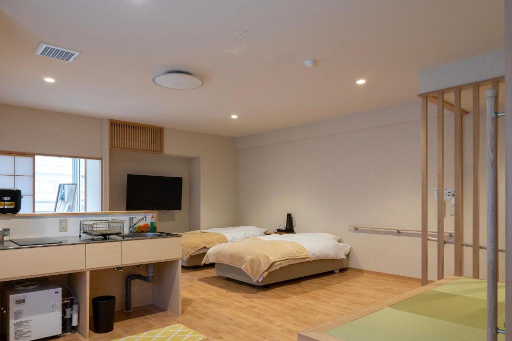 Yumori Onsen Hostel Tatami Room