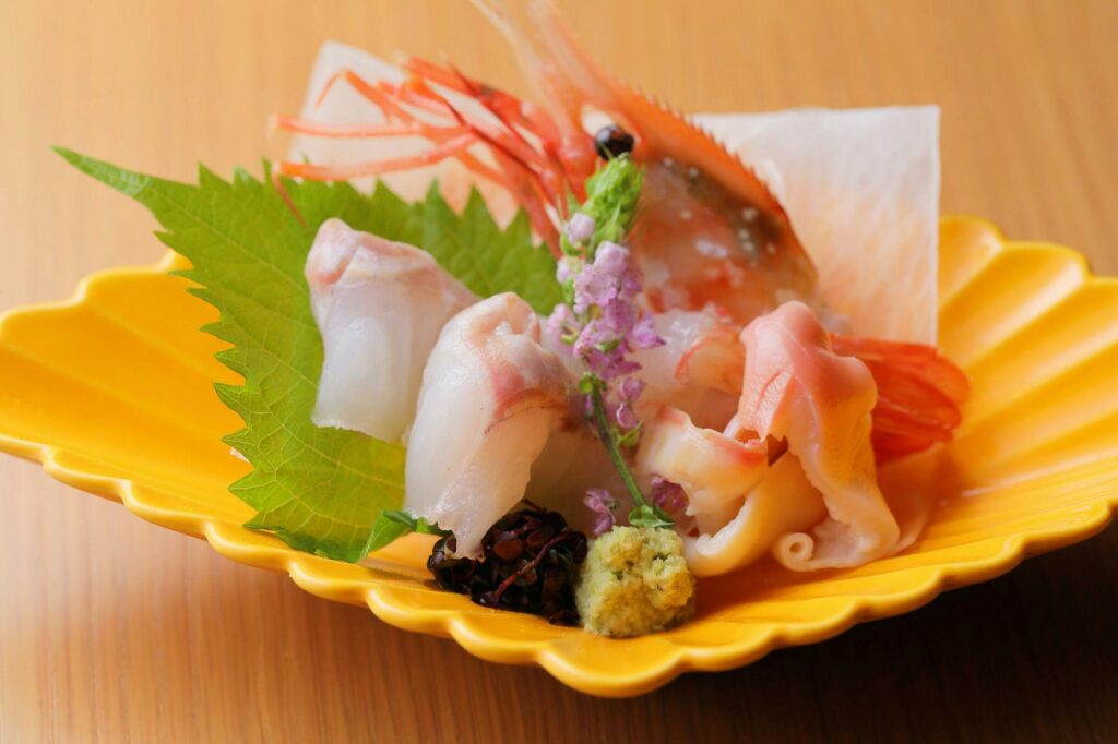 Sashimi Platter On A Yellow Plate