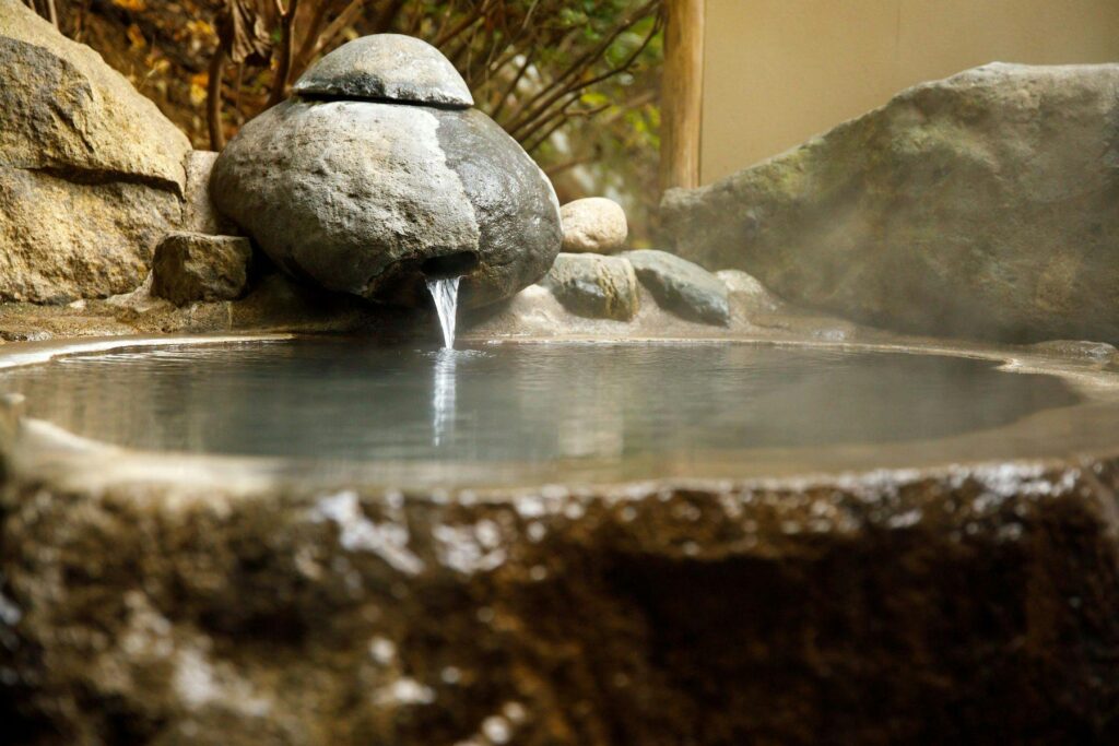 Stone Bath Close Up With Steam