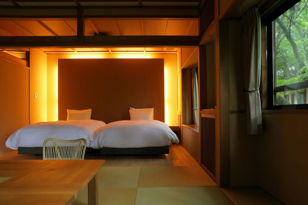 Twin Bed Room With Warm Lighting