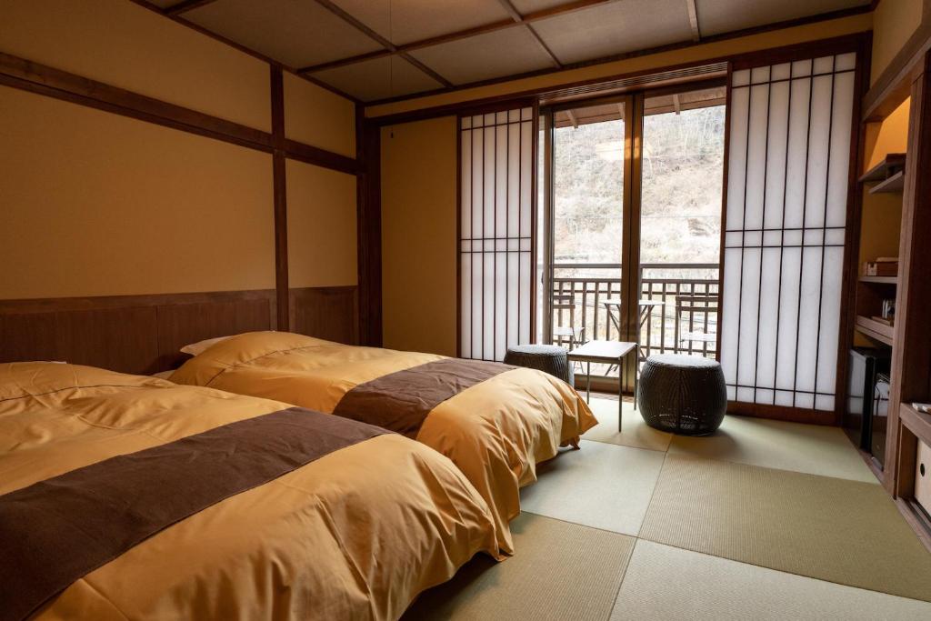 Shima Onsen Kashiwaya Ryokan room with western beds